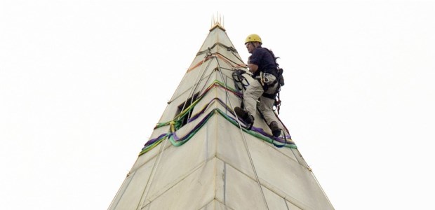 An engineer checked for damage done to the Washington Monument, a 555-foot obelisk located on the national mall in Washington, D.C., by a 5.8 magnitude earthquake on Aug. 23, 2011. The monument underwent repairs and was reopened May 12, 2014.