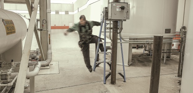 Incorrect: A missed bottom step can cause a fall. (Little Giant Ladder Systems photo)