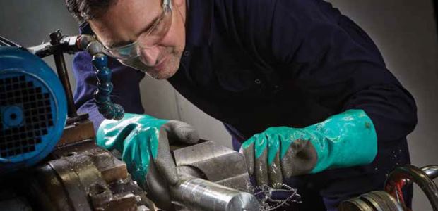 New hi-viz liners can act as an indicator when the outer coating is cut or compromised, prompting workers to replace their gloves before any harm is done. (Ansell photo)