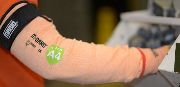 Routine tasks such as moving items in and out of bins can become hazardous if workers have to reach into barrels or other receptacles that contain sharp materials. (Magid photo)