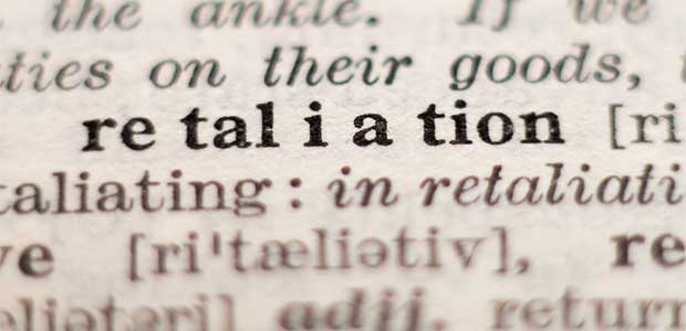 photo of word retaliation in a dictionary, spaced out for pronunciation 