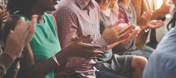 Conference Attendees Clapping