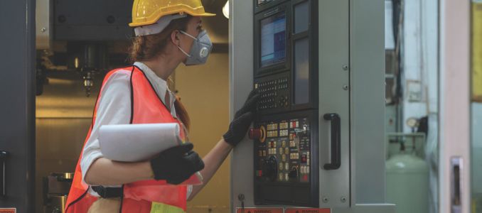 Female Facility Worker Wearing Respiratory PPE
