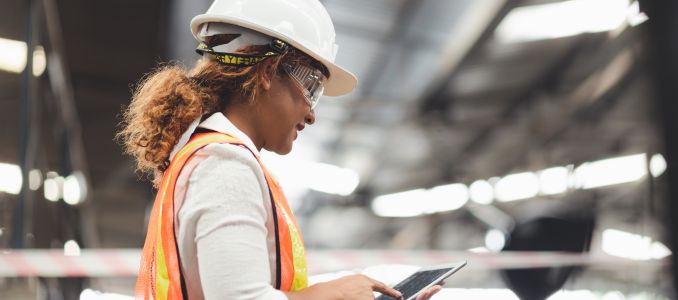 Female Construction Worker with Tablet
