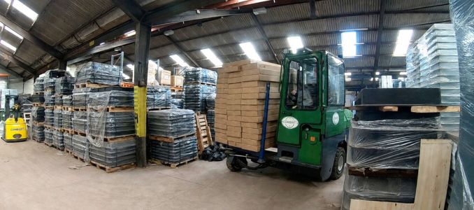 Multidirectional forklift moving items in warehouse
