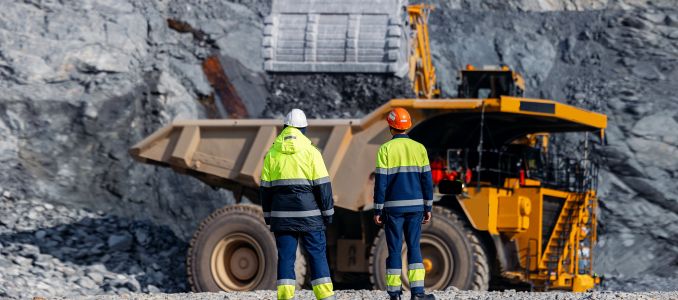 Workers Inspecting a Mine
