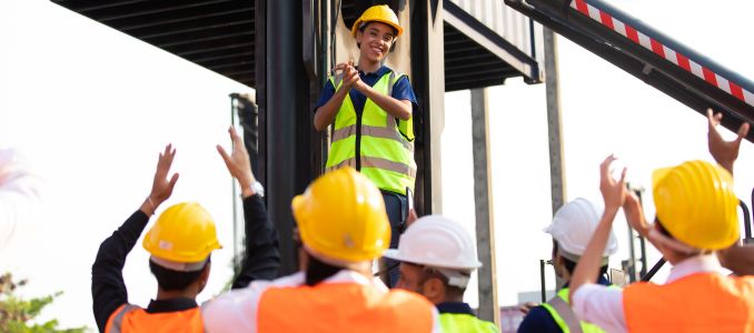 worker protest leader speaking with protester in workplace factory