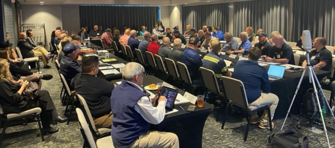 Participants review crisis scenarios during the West Virginia Chemical Sector Tabletop Exercise in Nitro, West Virginia. Alliance for Chemical Distribution.