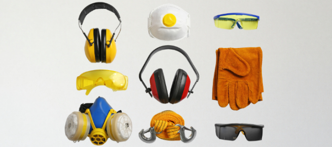 An assortment of personal protective equipment, including earmuffs, respirators, safety glasses, work gloves, and a tow strap, arranged against a white background.