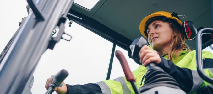 Woman Operating Machinery