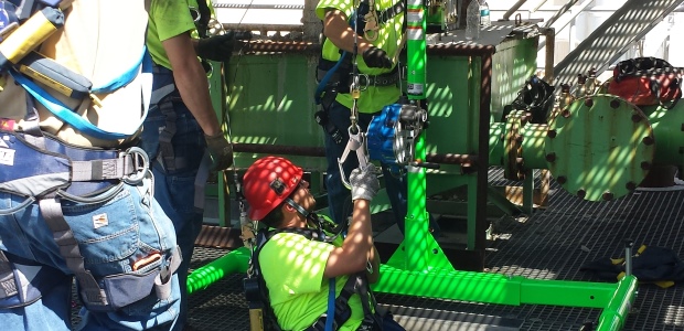 Davit arm systems and backup fall arrest systems make a vertical opening into a confined space safer during entry and exit. (Capital Safety photo)