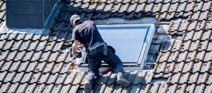 Roofer Working on a Skylight