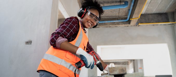 Woman holding drill