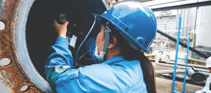 Female Worker Monitoring Gas