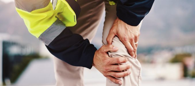 Professional with knee pain