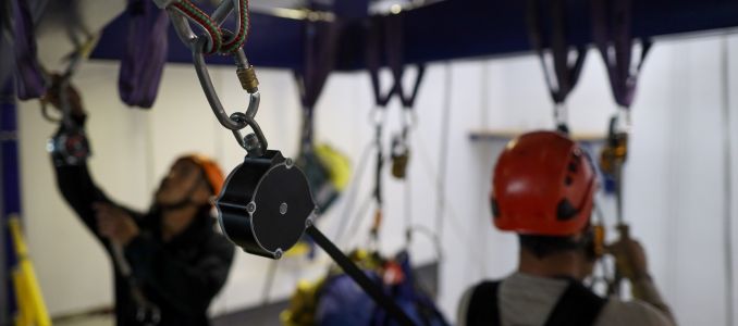 Safety work practices abseiler maintenance working at heights using an inertia reel shock absorber lanyard